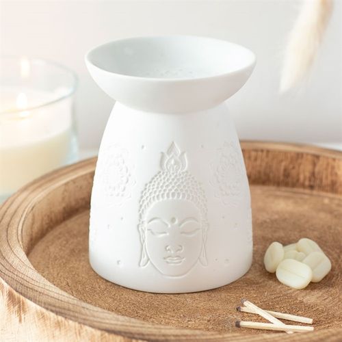 Elegant white ceramic Buddha face oil burner for warming wax and essential oils