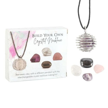 Build Your Own Crystal Necklace Kit featuring interchangeable pendants and assorted crystals for personalized jewelry