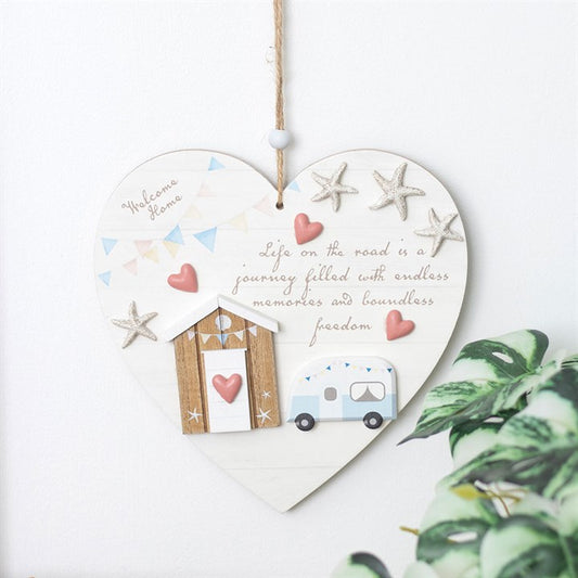 Life on the Road caravan decor hanging heart featuring a caravan and beach theme for vibrant home accents