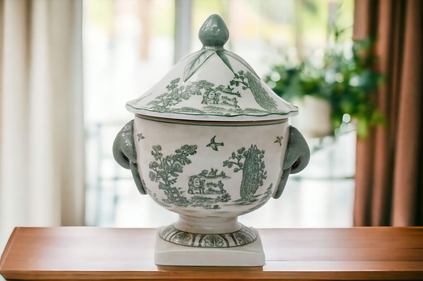 Elegant ceramic parrot urn 28cm with detailed nature-themed green illustrations by Geko Products