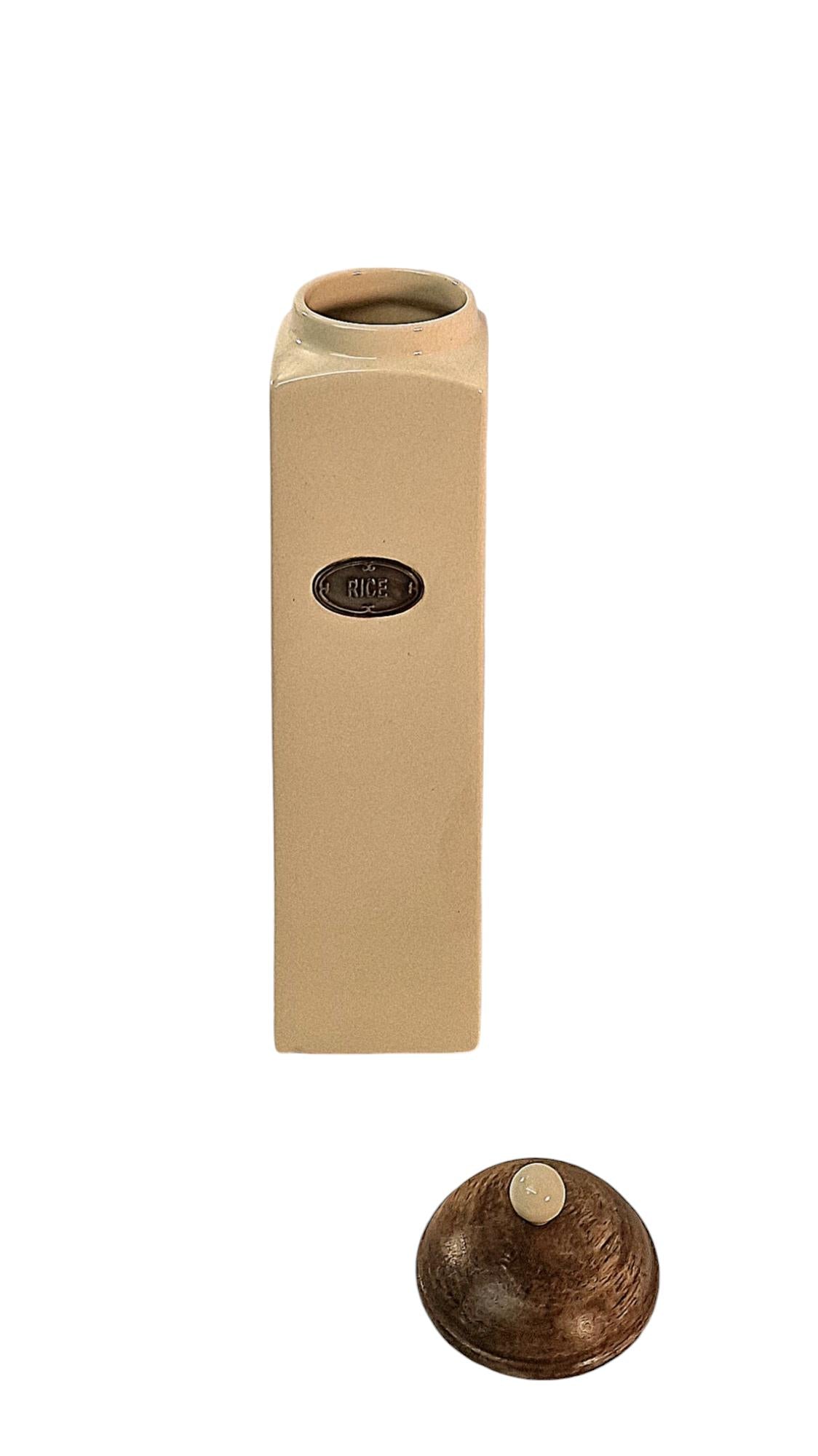 Ceramic rice jar with mango wood lid by Geko Products in beige color with oval logo