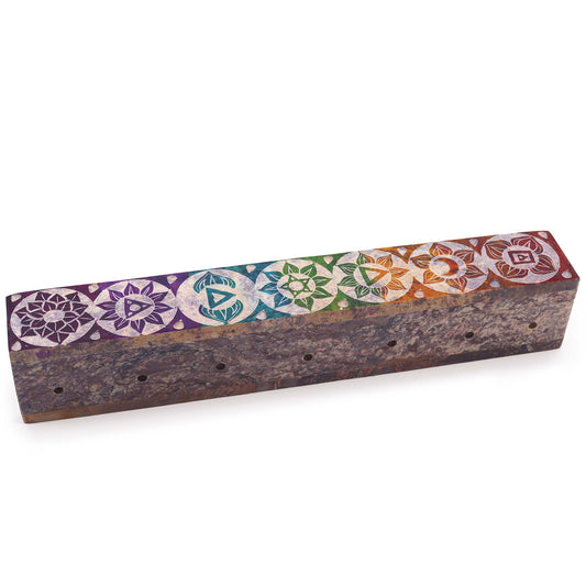 Chakra soapstone incense holder with intricate designs and smoke holes for aromatic incense sticks