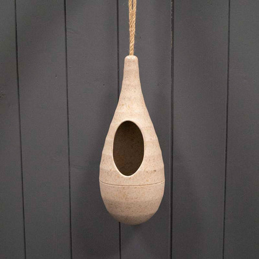 Earthy hanging nest by Geko Products in natural beige color with oval opening and rope hanger