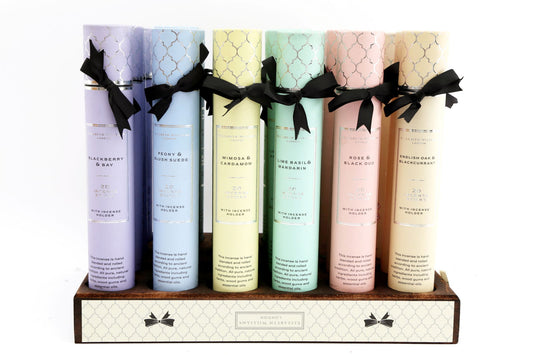 Elizabeth Williams incense set by Geko Products with six pastel-colored scent tubes tied with black ribbons