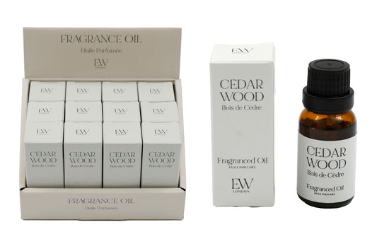 Cedar wood scented oil bottles and packaging by Geko Products displayed in a retail box