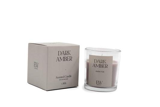 Geko Products dark amber scented candle in clear glass with matching beige box packaging