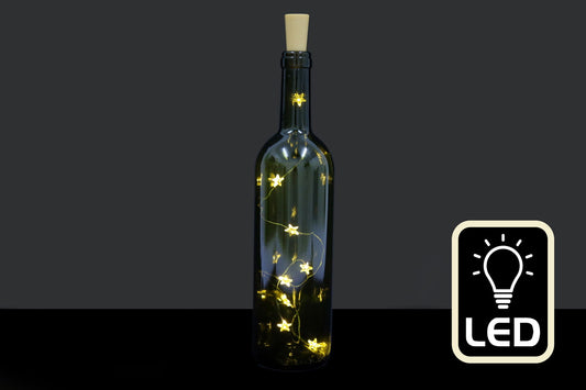 Geko Products LED star fairy lights for spiritual decor inside a green glass bottle with cork