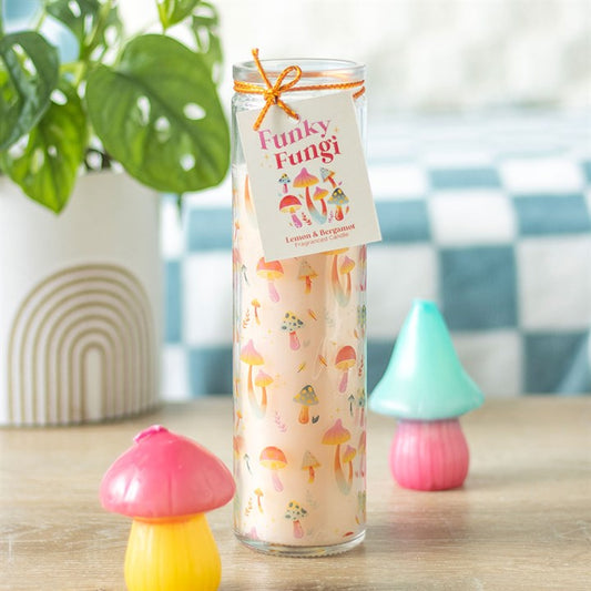 Funky Fungi mushroom candle in a decorative glass with vibrant mushroom print for unique home decor