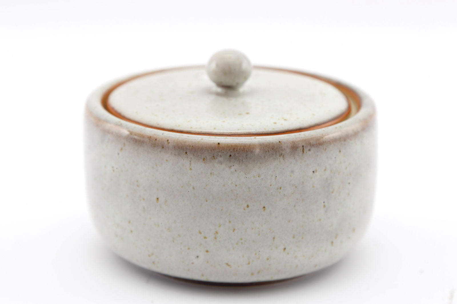 Geko Products taupe ceramic pot with lid featuring a smooth rounded design and subtle speckled texture