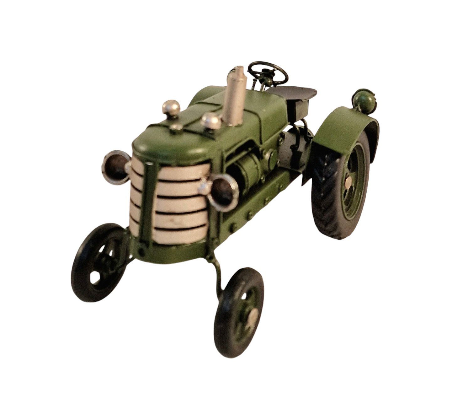 Green metal tractor ornament with detailed engine and large rear wheels by Geko Products