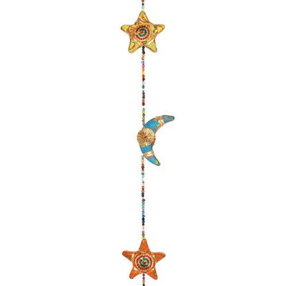 Colorful hanging moon and star decor with intricate designs and bells for enchanting room ambiance