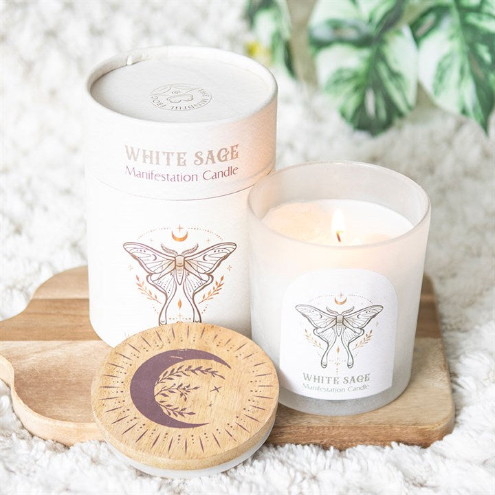 Luna Moth manifestation candle in a decorative white jar with a wooden lid for meditation and spiritual practices