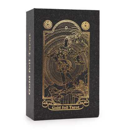 Luxury tarot card set with gold foil design and matching guidebook in a stylish black box