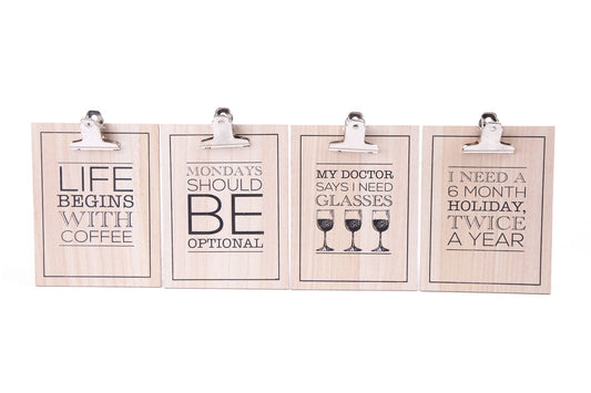 Motivational wooden clipboards with uplifting quotes and metal clips