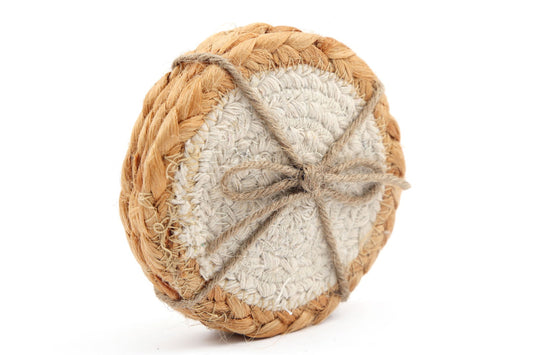 Set of braided jute coasters tied with natural twine for rustic and eco-friendly table protection