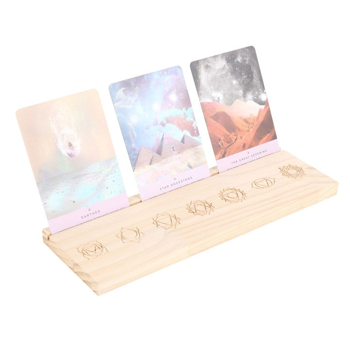 SD Connect natural chakra card stand with engraved chakra symbols holding three colorful chakra cards
