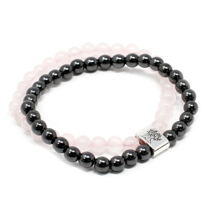 Rose Quartz Magnetic Bracelet with smooth pink and black beads for healing and spiritual benefits