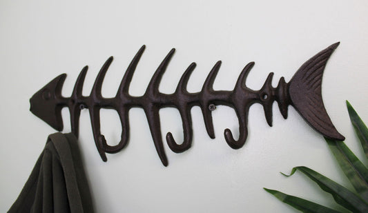 Geko Products rustic fish skeleton wall hook in dark metal with multiple hooks on white wall