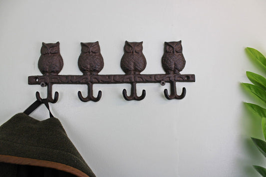Geko Products rustic owl wall hooks with four owl figures and hooks on a white wall