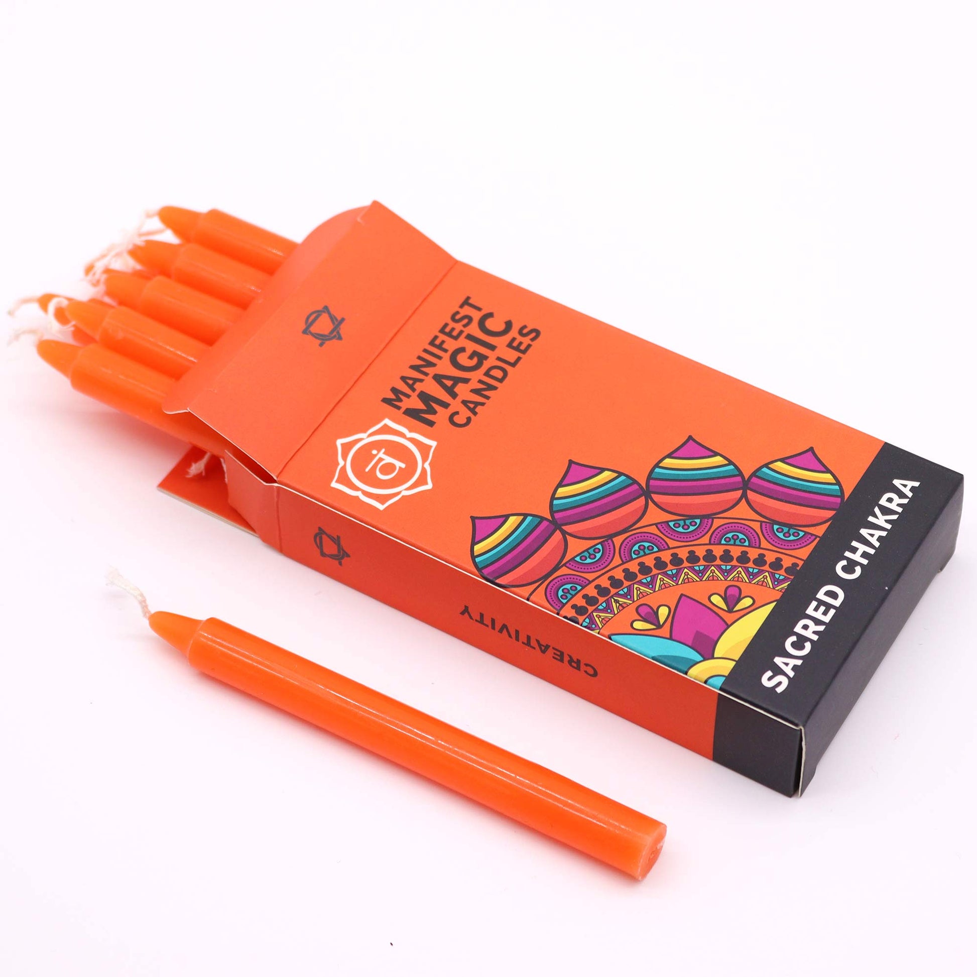 Orange chakra candles in packaging.