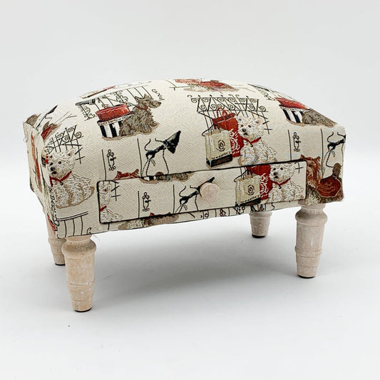 Scottie dog footstool with drawer featuring a printed fabric design and wooden legs by Geko Products