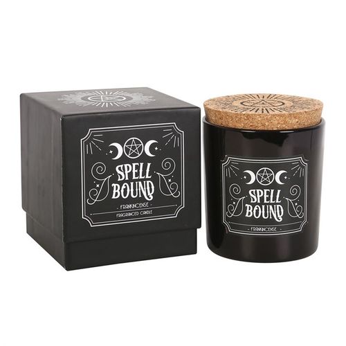 Spell Bound Frankincense Candle in a black jar with cork lid and decorative packaging 