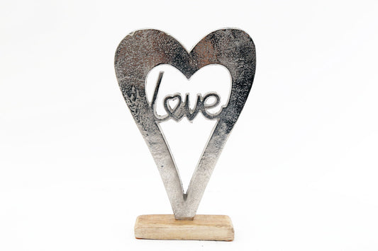 Silver heart sculpture with love text on wooden base decorative metal art