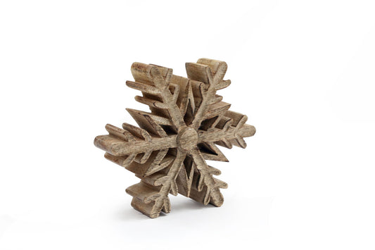 Small wooden snowflake decor made by Geko Products with intricate carved details