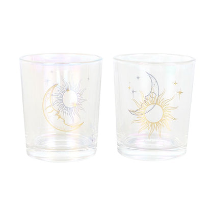 Iridescent Sun and Moon Candle Holders in clear glass, featuring decorative sun and moon designs.