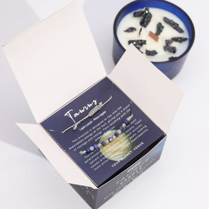 Taurus bracelet in a box beside a candle from Zodiac Crystal Candle with Gemstone Bracelet