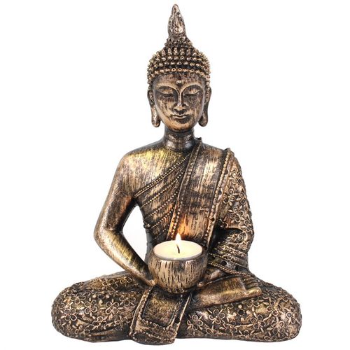Sitting Thai Buddha tea light holder in ornate design with a candle for serene ambiance