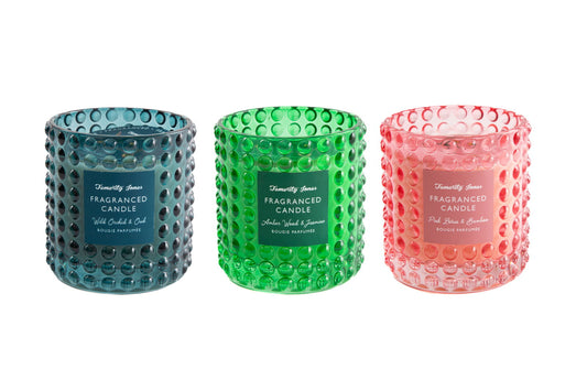 Set of three decorative glass candles in blue, green, and pink textured glass holders