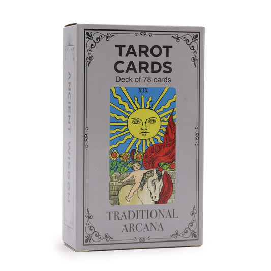 Traditional tarot cards with guidebook in a detailed box featuring vibrant sun and nature designs