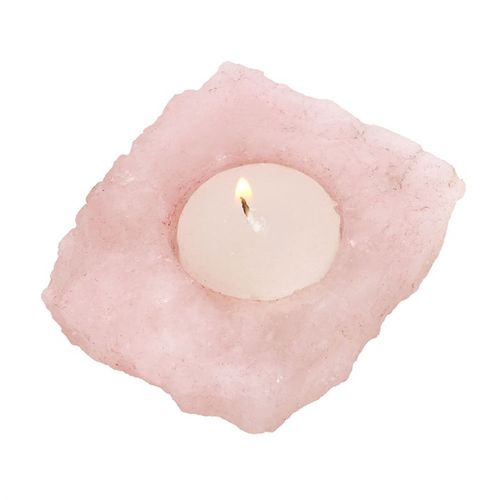 Elegant rose quartz tealight holder featuring a natural shape with a lit candle, perfect for spiritual ambiance