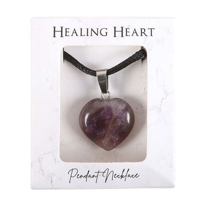 Amethyst crystal necklace featuring a heart-shaped pendant on a black cord, ideal for healing and spiritual practices