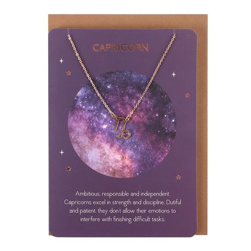 Capricorn zodiac necklace displayed on a cosmic-themed card showcasing its symbolism and characteristics