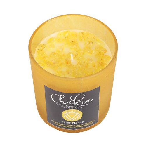 Solar plexus chakra candle infused with lemon scent and yellow jade crystal chips for spiritual healing and relaxation