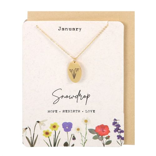 January snowdrop birth flower necklace and card featuring an elegant gold tone pendant on a floral-themed background