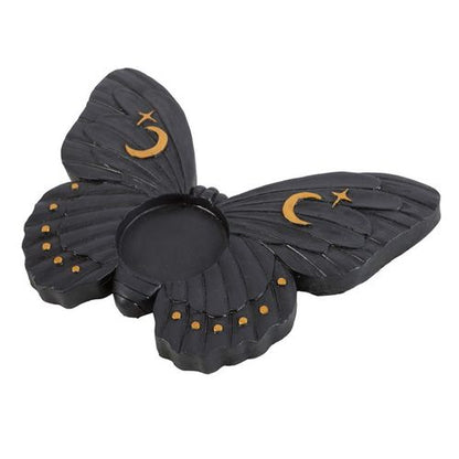 Artistic black moth candle holder with gold accents, perfect for tealights and enhancing spiritual decor