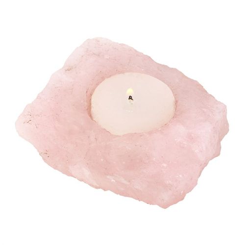 Natural rose quartz tealight holder featuring a smooth, soft pink surface that holds a candle securely for calming illumination.